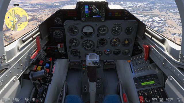 Kokpit L-39 za letu: prístrojová doska, GPS navigácia hore a páka riadenia